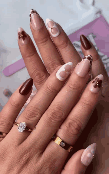 Brown and nude almond press-on nails with flower designs